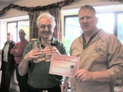 The turning of the month winner Graham Holcroft received his certificate from Tony Handford